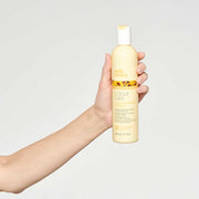 milk-shake-sulfate-free-color-shampoo-in-hand